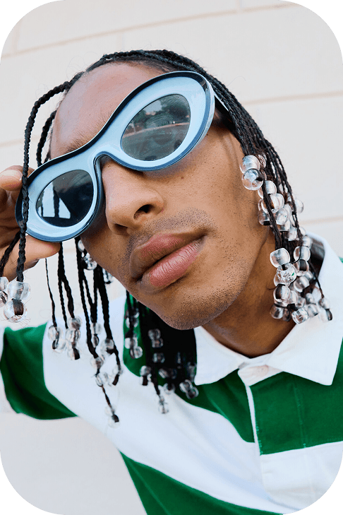 Blond white girl with rings and green blouse