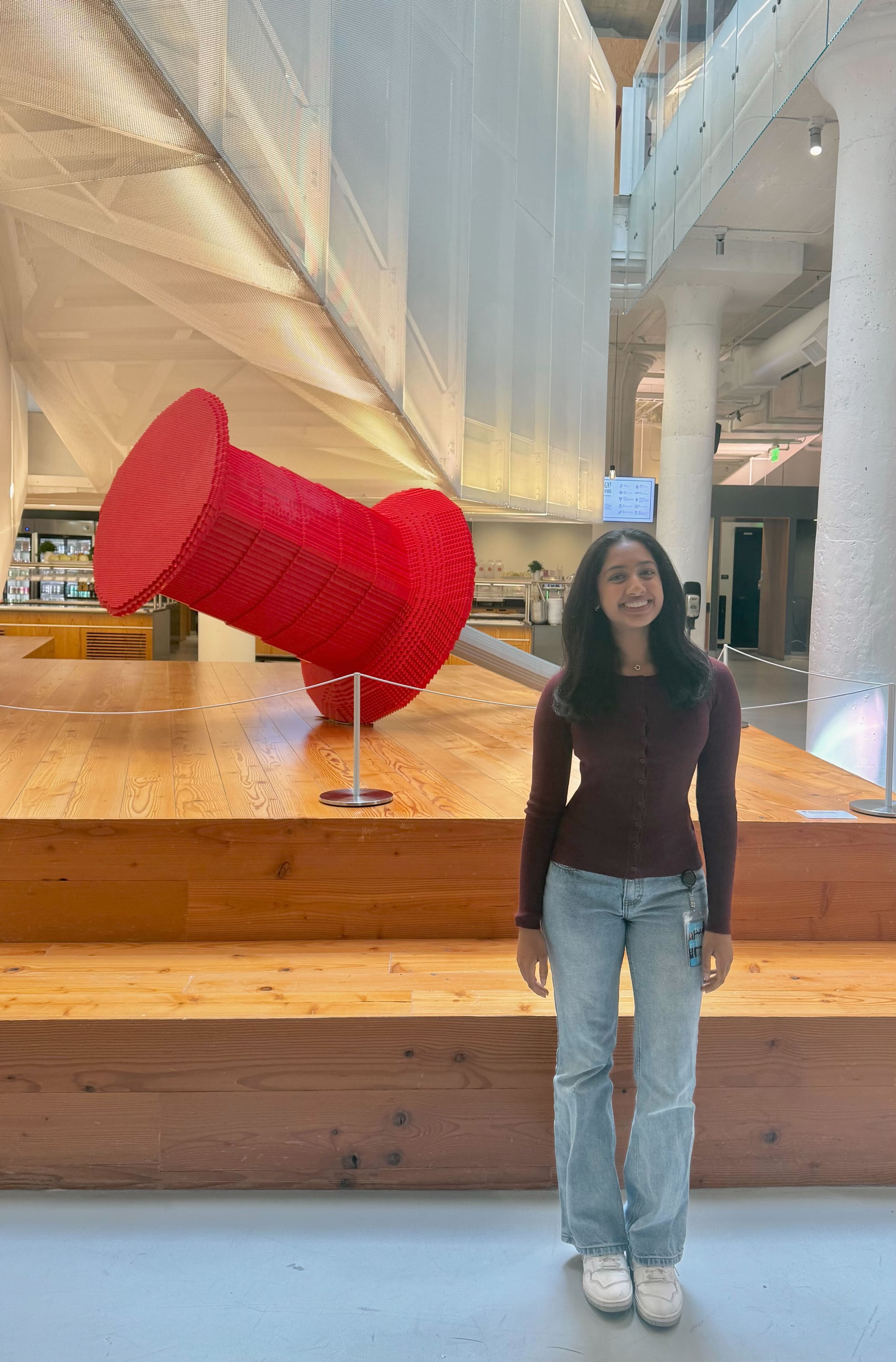 The author at Pinterest headquarters in front of a giant Pin sculpture